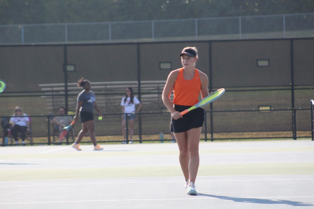 Senior Delaney Bachman at a home tennis match on Sept. 18.