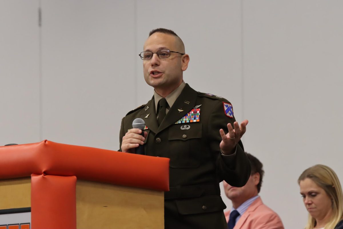 Lt/Col. Airic Raus addressed the audience as the guest speaker of the hour.