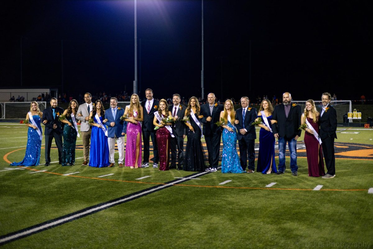 Homecoming Queen candidates and their escorts before the Queen was announced 