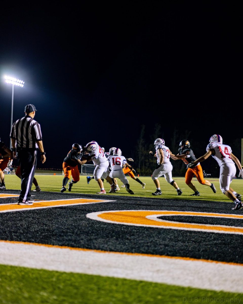 Platte County Pirates on the offensive moments before they score a touchdown 