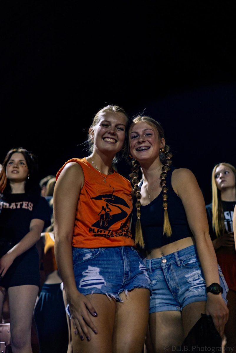 Platte County Students Junior Kylie Kinzey and Freshman Thais Thompson posing for a photo op