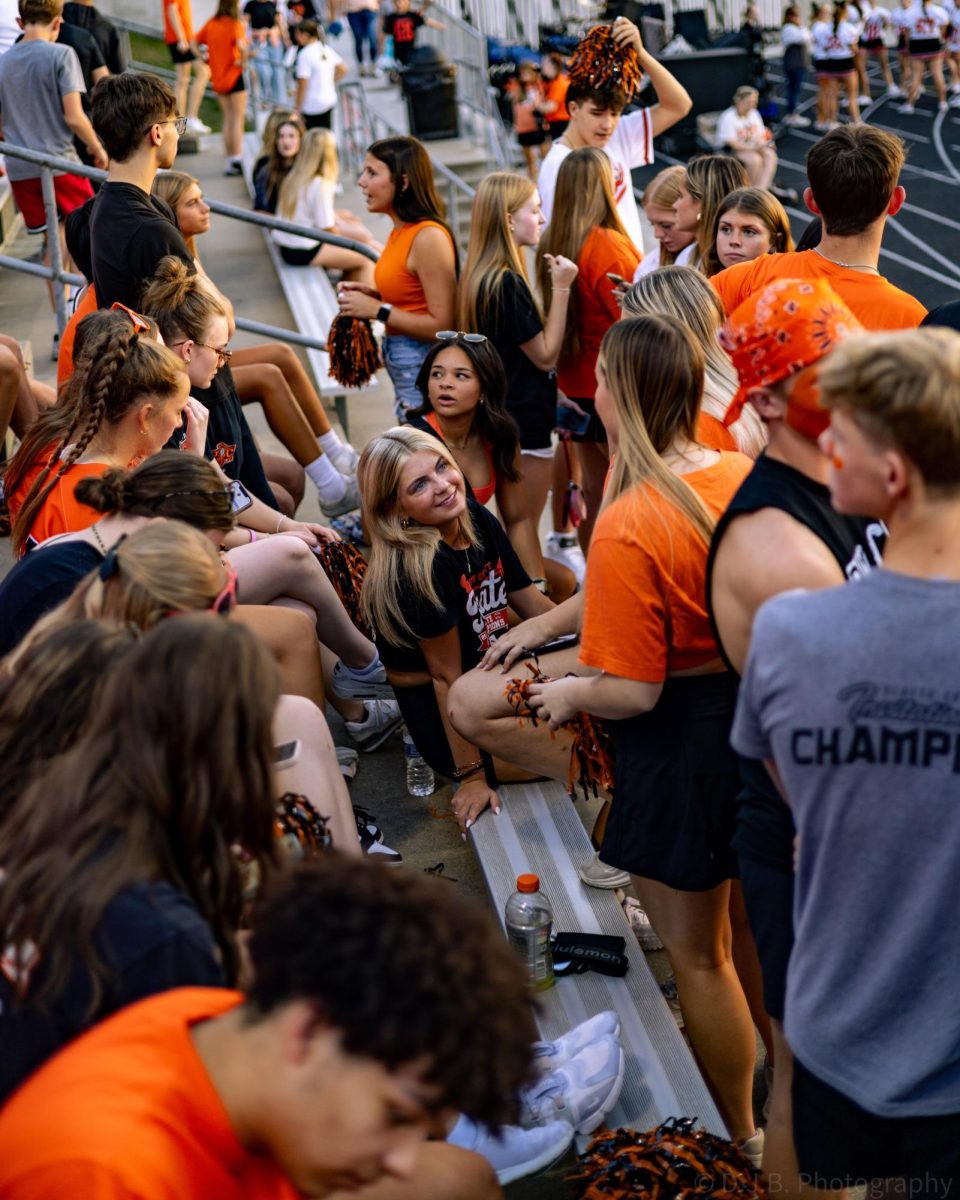 Platte County students converse about how the game is going to go.