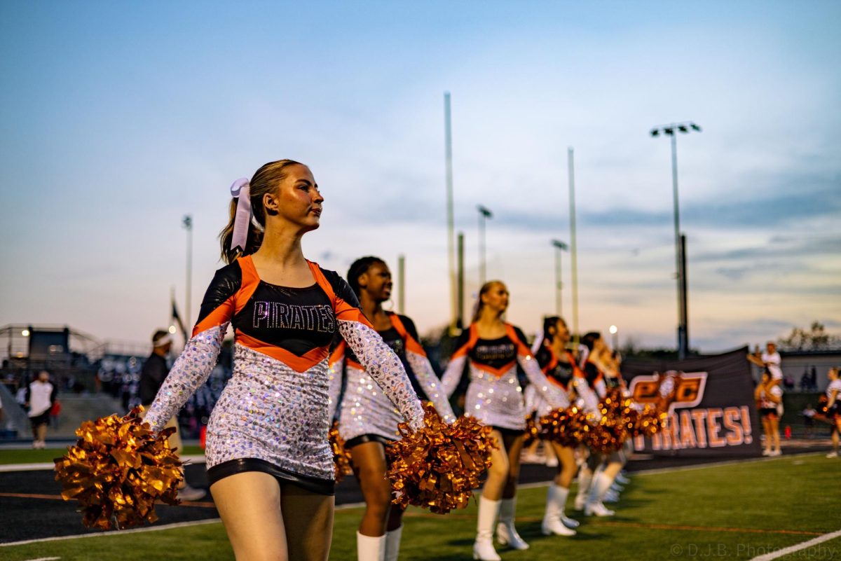 Treasures dance team lines up before the football players come out to the field 