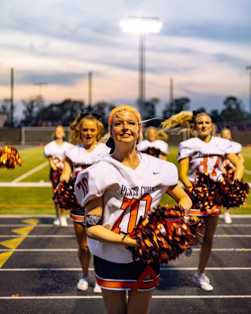 Senior Kyra Renno cheers on her team 