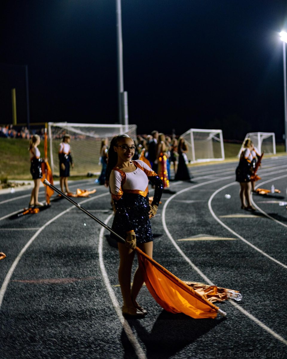 Senior Myah Harris poses for photo after preforming for the game 