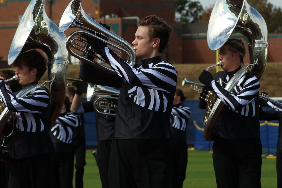 Junior Noah Smiley plays his baritone in the show 'Unleashed" at the competition on Sept. 21.