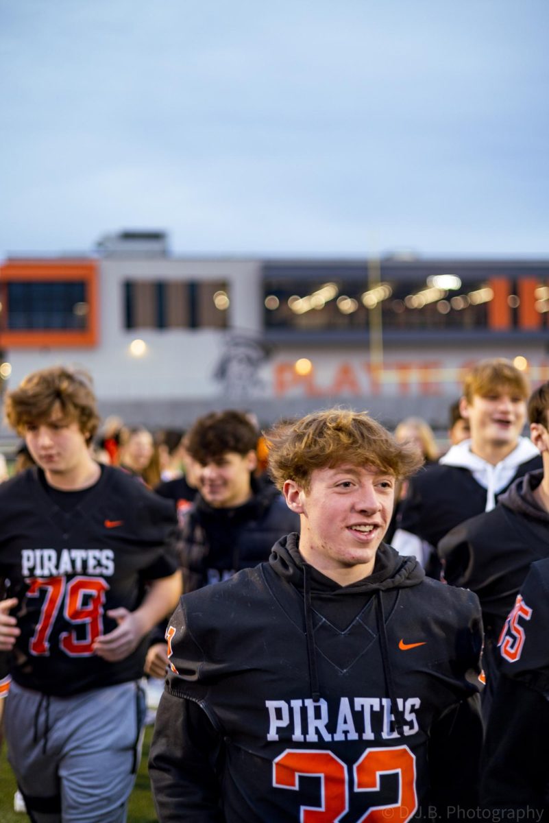 Live on the TODAY Show Junior Adam Gisler walks down the aisle formed by the cheerleaders with the rest of the football team  