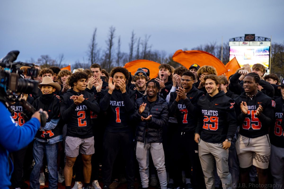 Live on the TODAY Show the Pirates Football team claps for the camera 