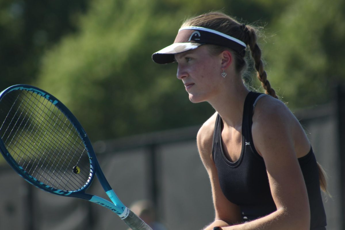 McBratney prepares for an incoming serve against Liberty North in a doubles match Sept. 3, 2024.