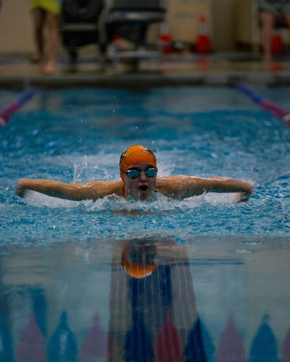 Sophomore Alex Yurko of the Platte County Pirates Girls Swim Team swims in the 100m butterfly at an away meet​ at Raytown Schools Wellness Center on Jan. 28.