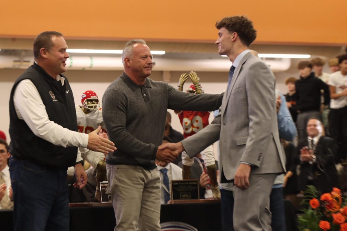 Marriott gets congratulated by previous Simone winners. 
