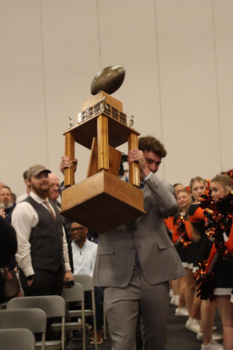 Marriott took a lap around the gym with the traveling trophy.