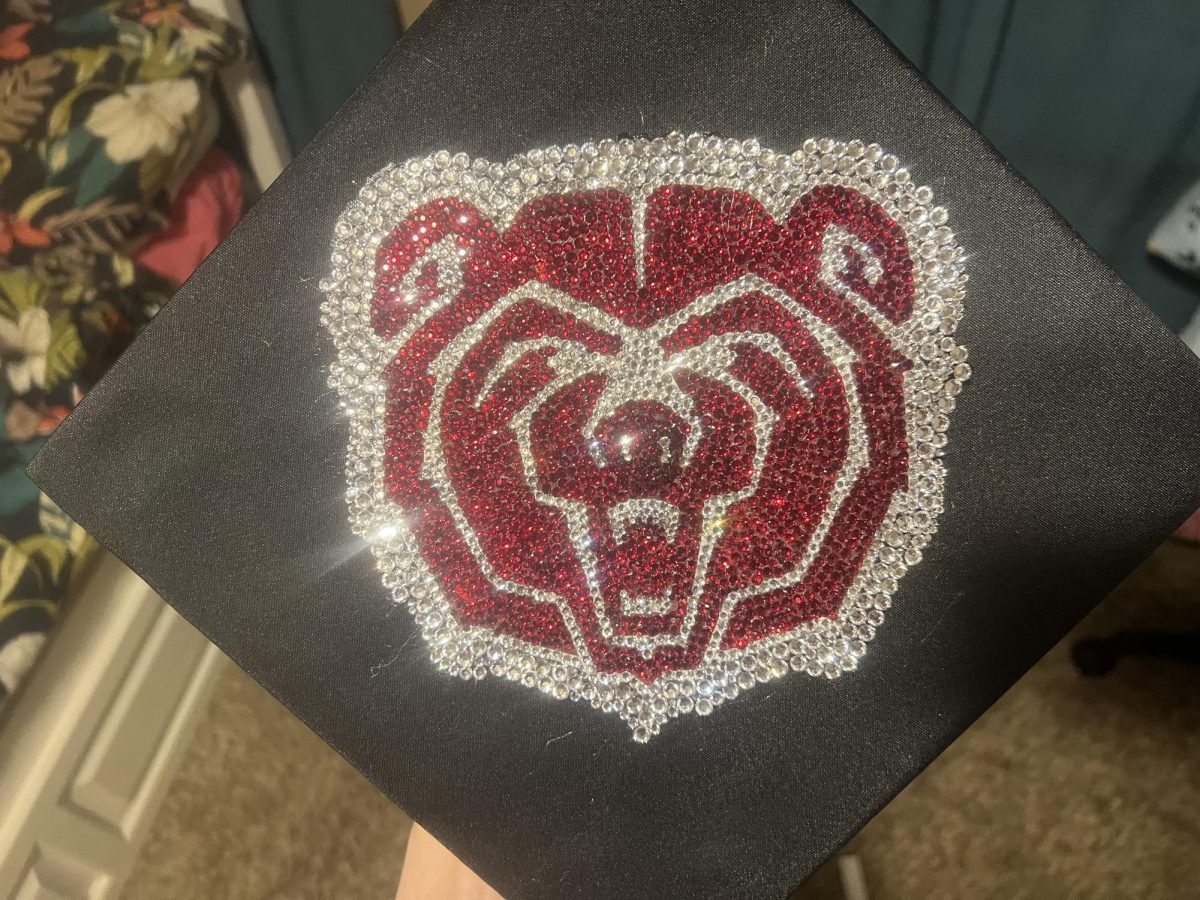 Senior Gabriella Ciccarelli's graduation cap bedazzled with the Missouri State logo